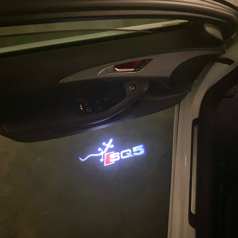 AUDI SQ5 LOGO PROJECTOT LIGHTS Nr.58 (quantità 1 = 2 pellicole logo /2 luci porta） 