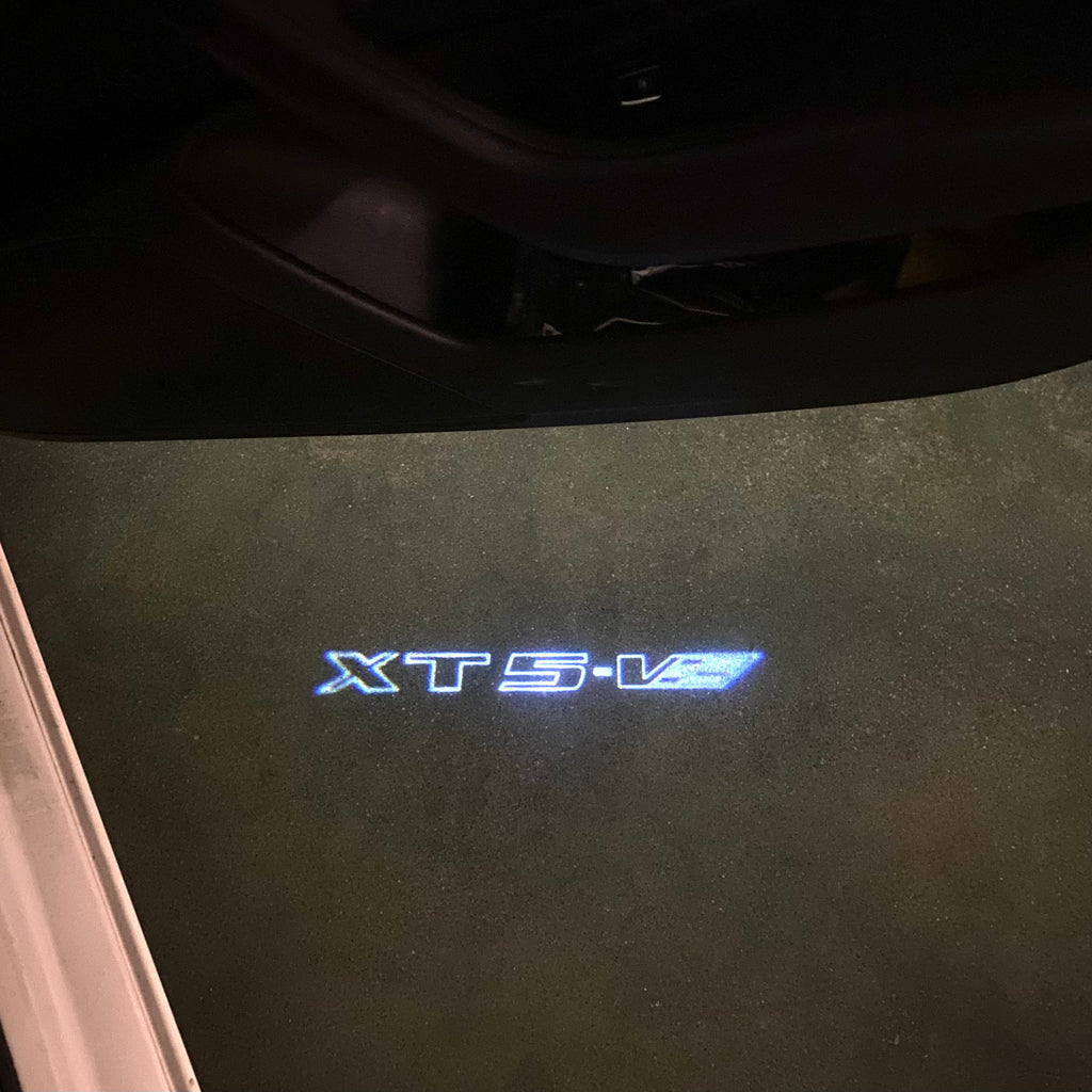 CADILLAC XTS LOGO PROJECTOT LIGHTS Nr.2602 (quantity 1 = 2 Logo Films /2 door lights）