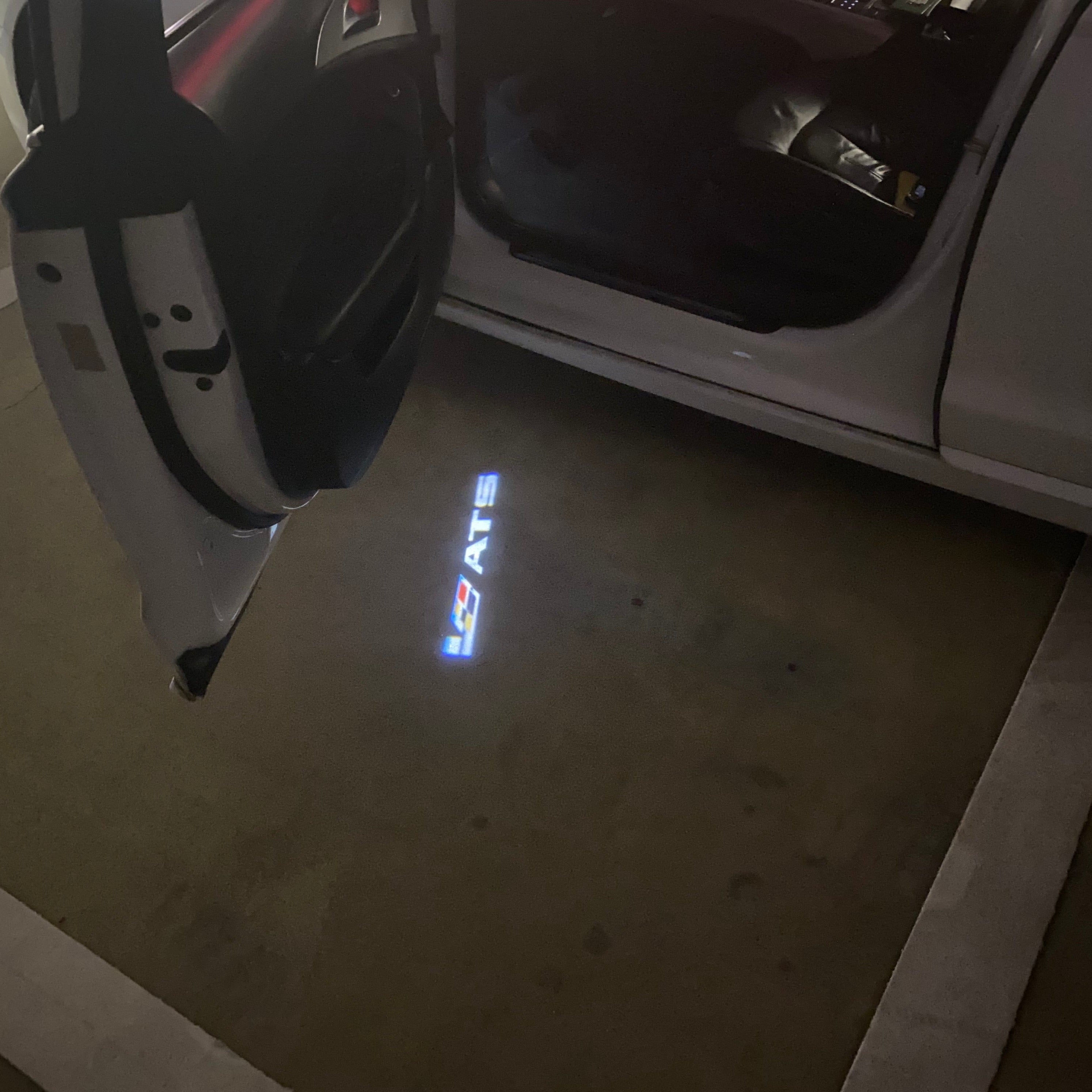 CADILLAC ATS LOGO PROJECTOT LIGHTS Nr.2591 (quantity 1 = 2 Logo Films /2 door lights）