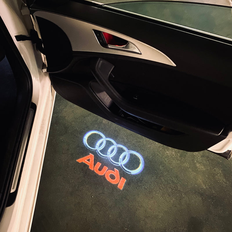 AUDI Original LOGO PROJECTOT LIGHTS Nr.009 (quantità 1 = 2 pellicole logo /2 luci porta） 