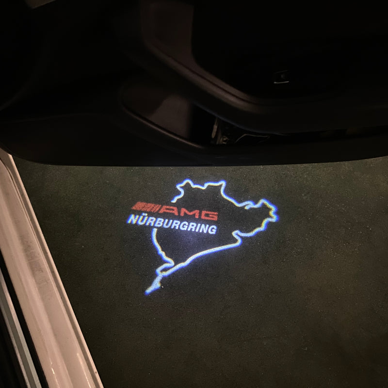 MERCEDES BENZ AMG NÜRBURGRING LOGO PROJECTOT LIGHTS Nr.01 (quantità 1 = 1 set/2 luci porta)