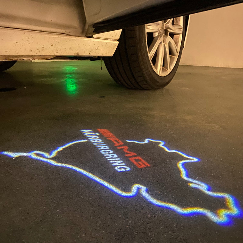 MERCEDES BENZ AMG NÜRBURGRING LOGO PROJECTOT LIGHTS Nr.01 (quantità 1 = 1 set/2 luci porta)