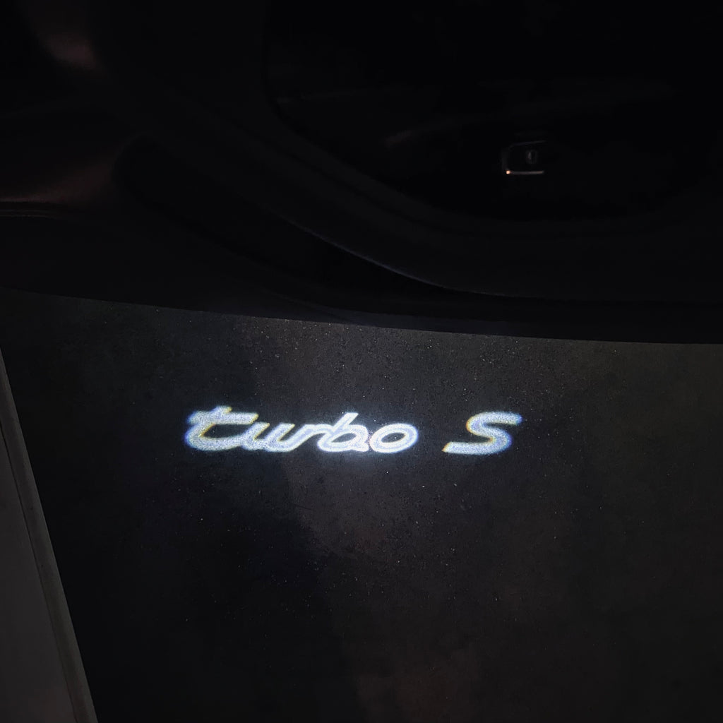 PORSCHE TURBO S  LOGO PROJECTOT LIGHTS Nr.8123(quantity  1 =  2 Logo Film /  2 door lights)