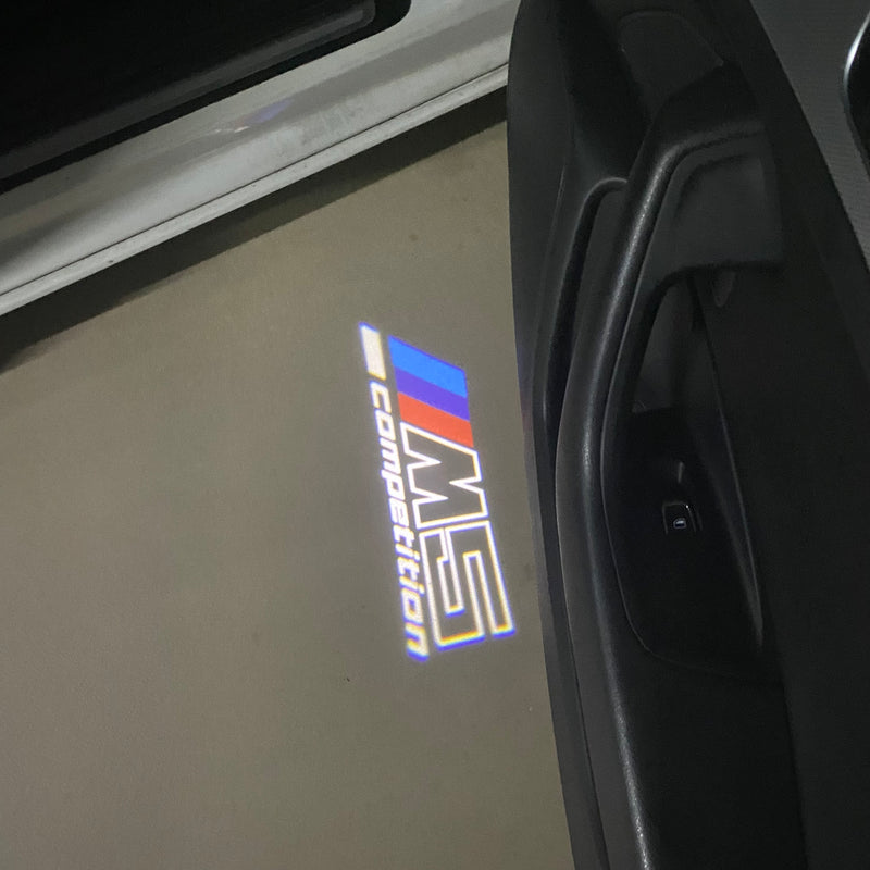 LUCI BMW M5 LOGO PROJECTOT Nr.23 (quantità 1 = 1 set/2 luci porta) 