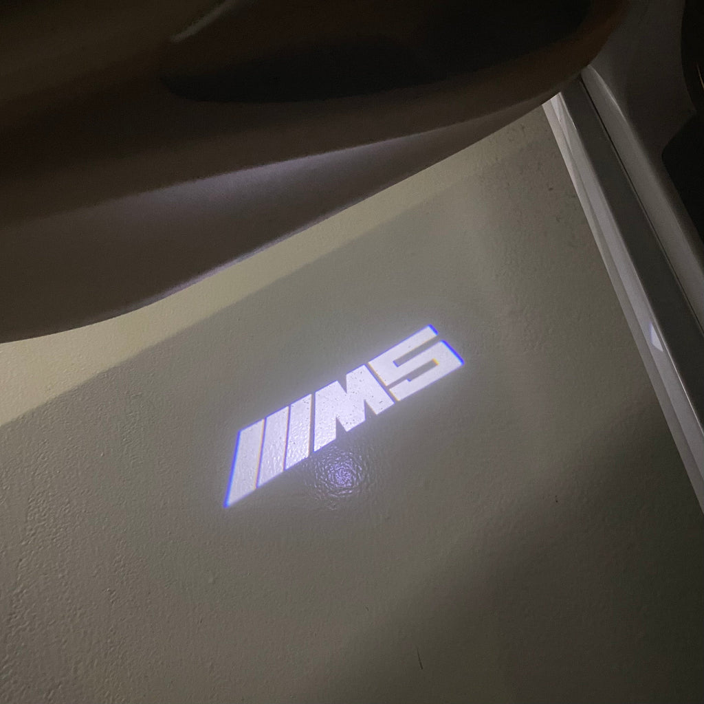 BMW 5 SERIES M5 LOGO PROJECTOT LIGHTS (quantity 1 = 1 sets/2 door lights)Nr.bmw00258
