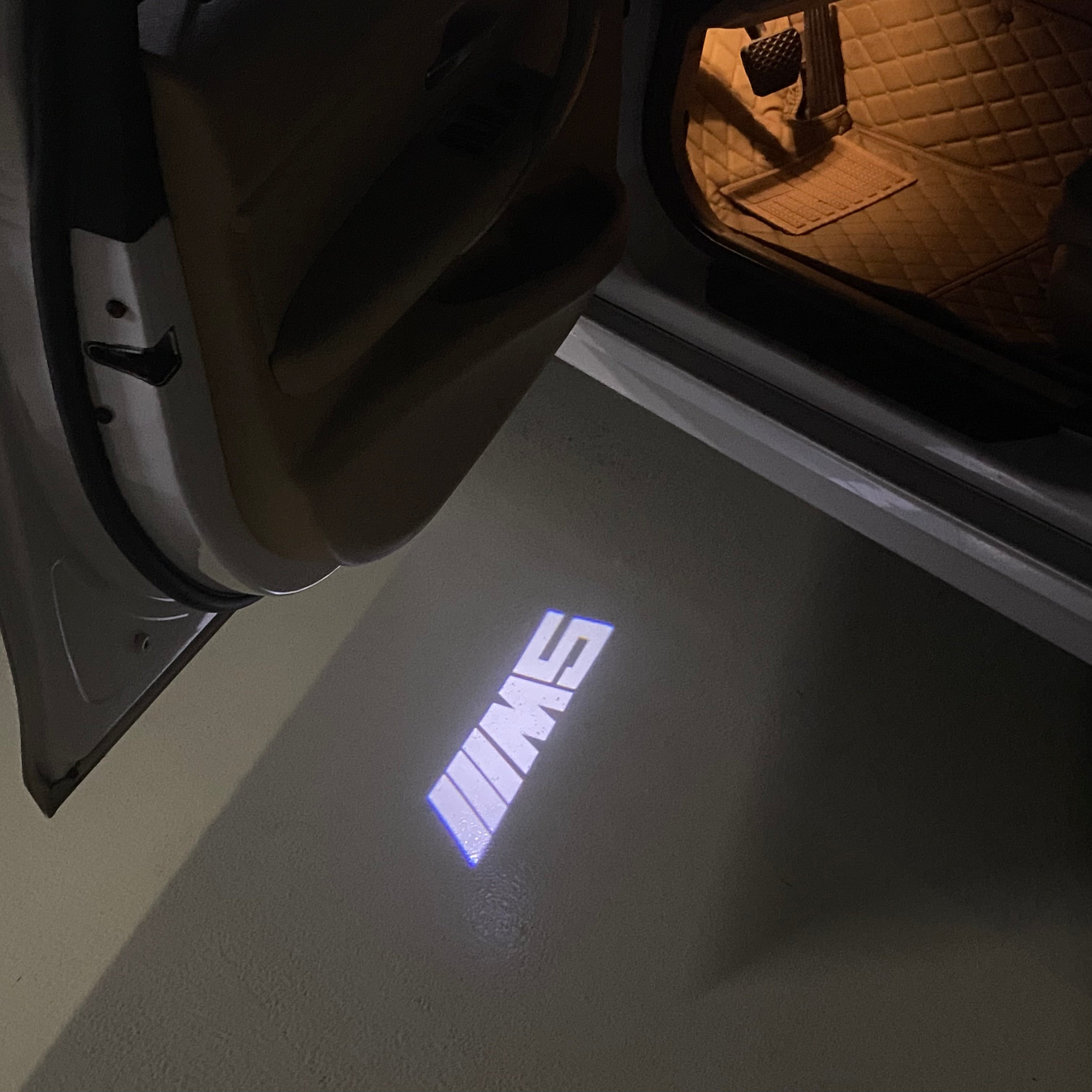 BMW 5 SERIES M5 LOGO PROJECTOT LIGHTS (quantity 1 = 1 sets/2 door lights)Nr.bmw00258