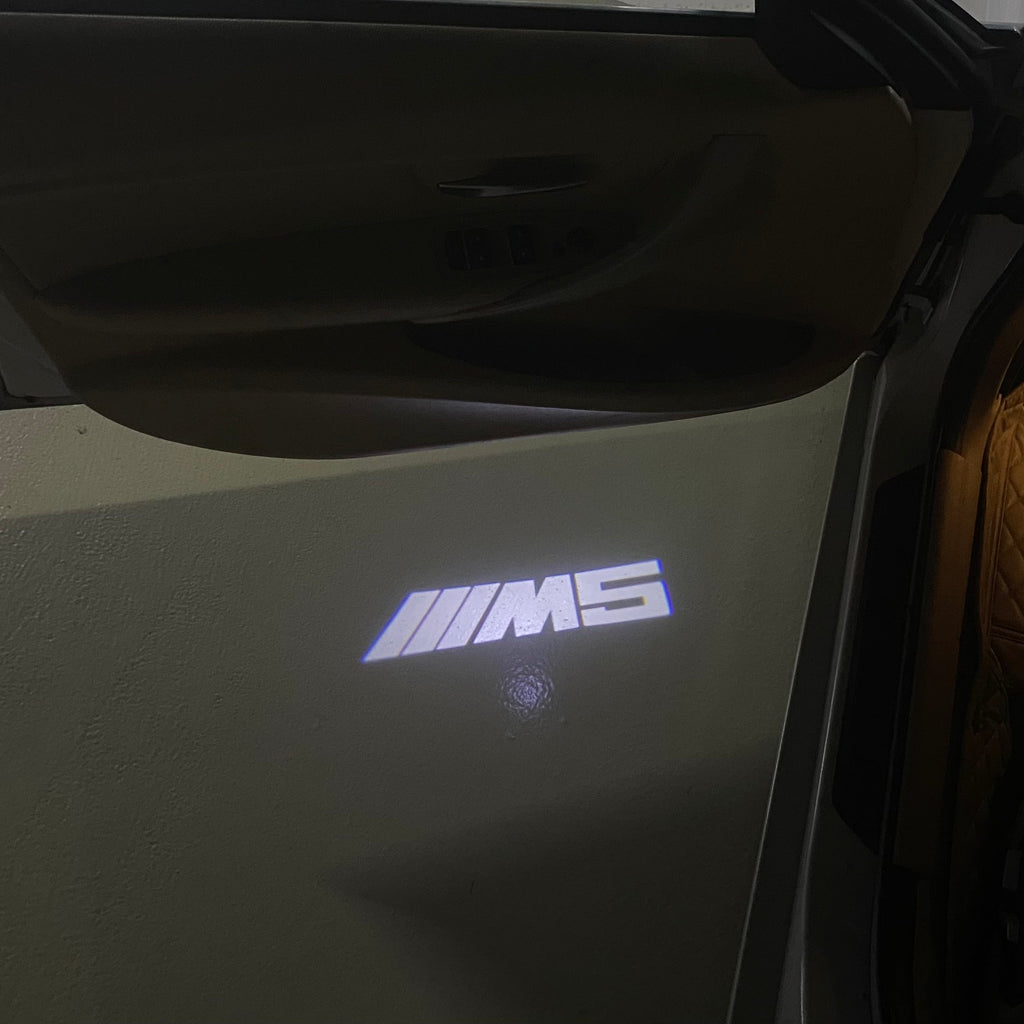 BMW 5 SERIES M5 LOGO PROJECTOT LIGHTS (quantity 1 = 1 sets/2 door lights)Nr.bmw00258
