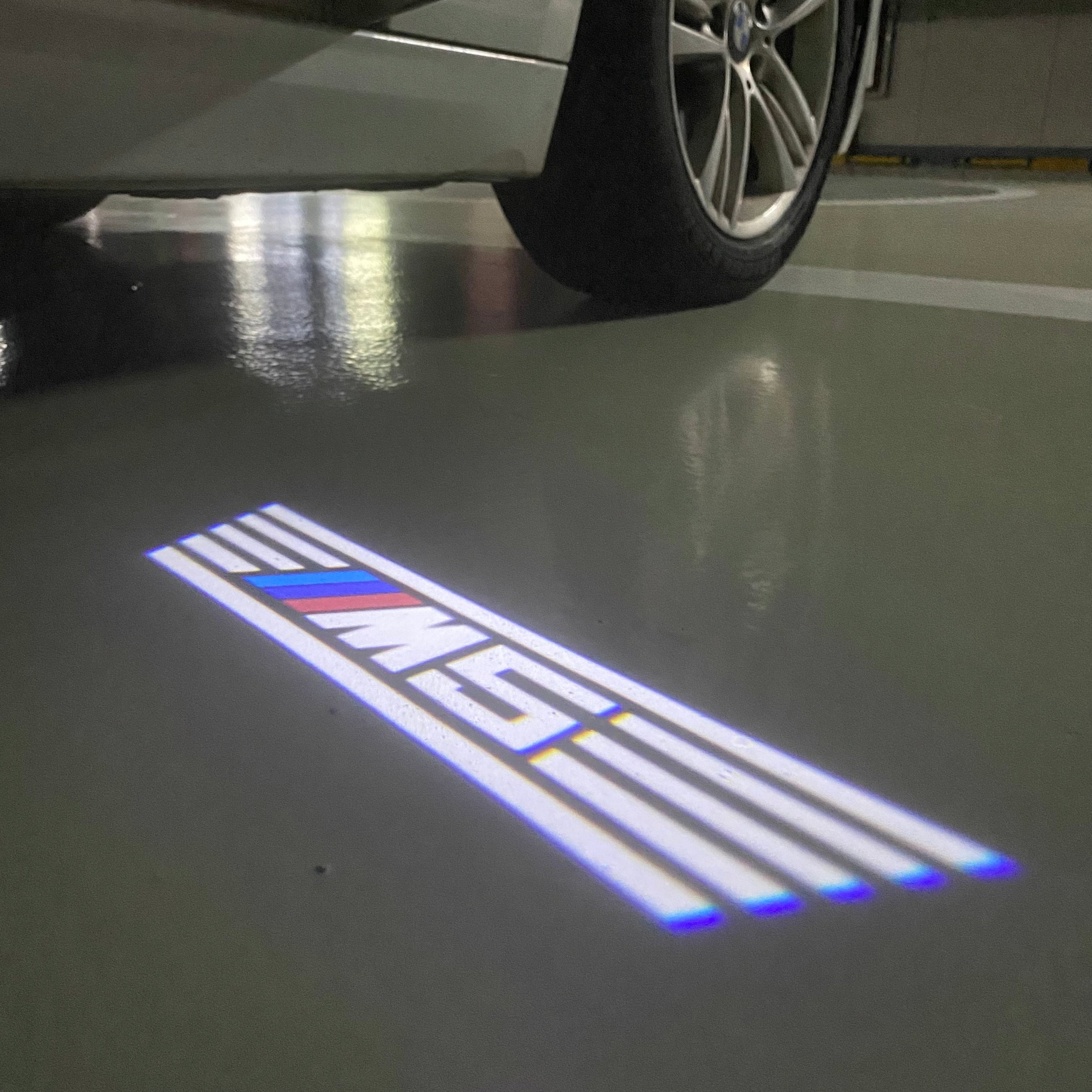 BMW 5 SERIES M5 LOGO PROJECTOT LIGHTS (quantity 1 = 1 sets/2 door lights)Nr.bmw00259