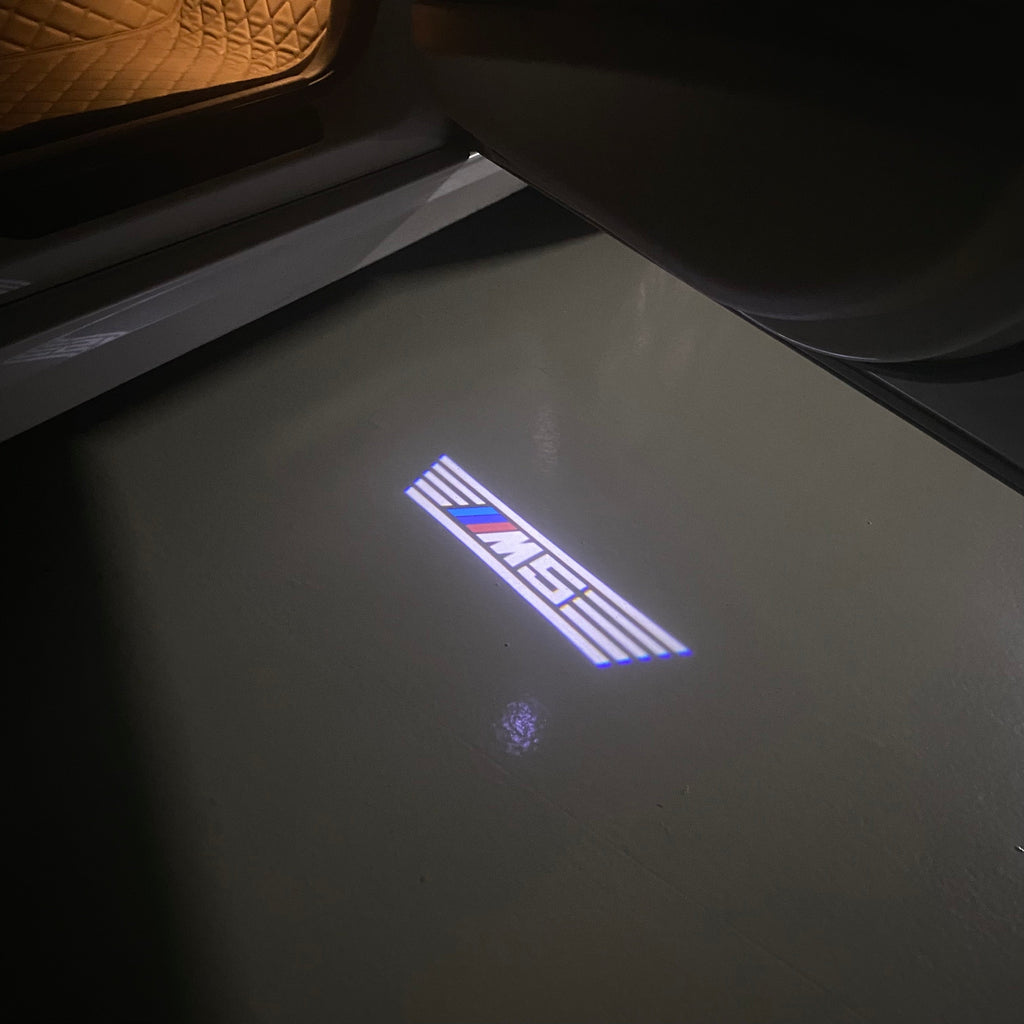 BMW 5 SERIES M5 LOGO PROJECTOT LIGHTS (quantity 1 = 1 sets/2 door lights)Nr.bmw00259