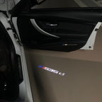 BMW  5 SERIES 535    LOGO PROJECTOT LIGHTS (quantity 1 = 1 sets/2 door lights)Nr.bmw00231