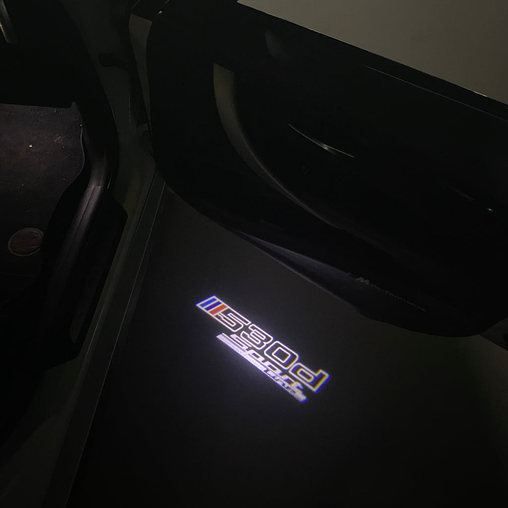 BMW 5 SERIES 530 d  LOGO PROJECTOT LIGHTS (quantity 1 = 1 sets/2 door lights)Nr.bmw00240