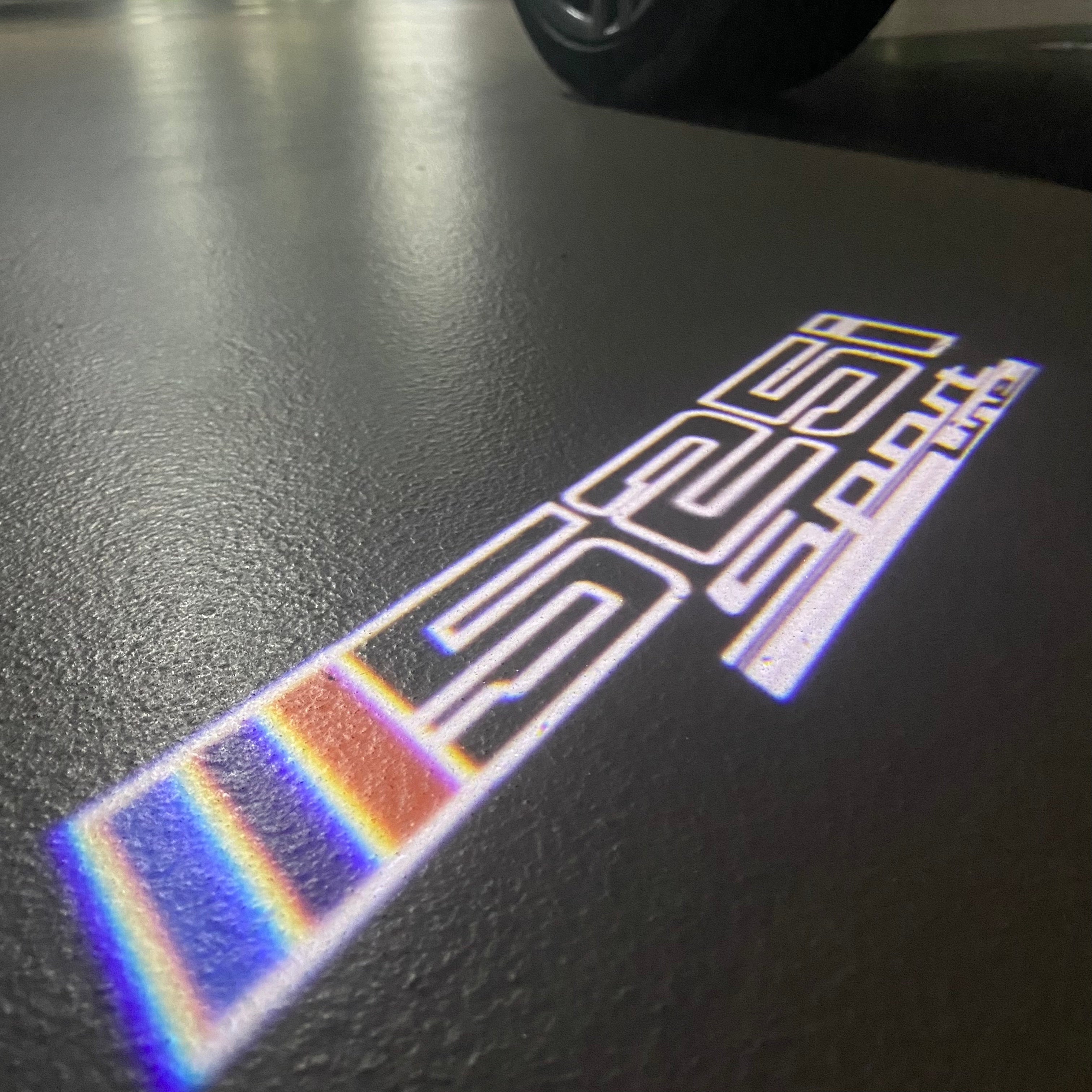 BMW  5 SERIES 525 i LOGO PROJECTOT LIGHTS (quantity 1 = 1 sets/2 door lights)Nr.bmw00243