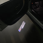 BMW  5 SERIES 525 i LOGO PROJECTOT LIGHTS (quantity 1 = 1 sets/2 door lights)Nr.bmw00243