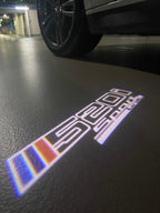 BMW  5 SERIES 520 i    LOGO PROJECTOT LIGHTS (quantity 1 = 1 sets/2 door lights)Nr.bmw00320