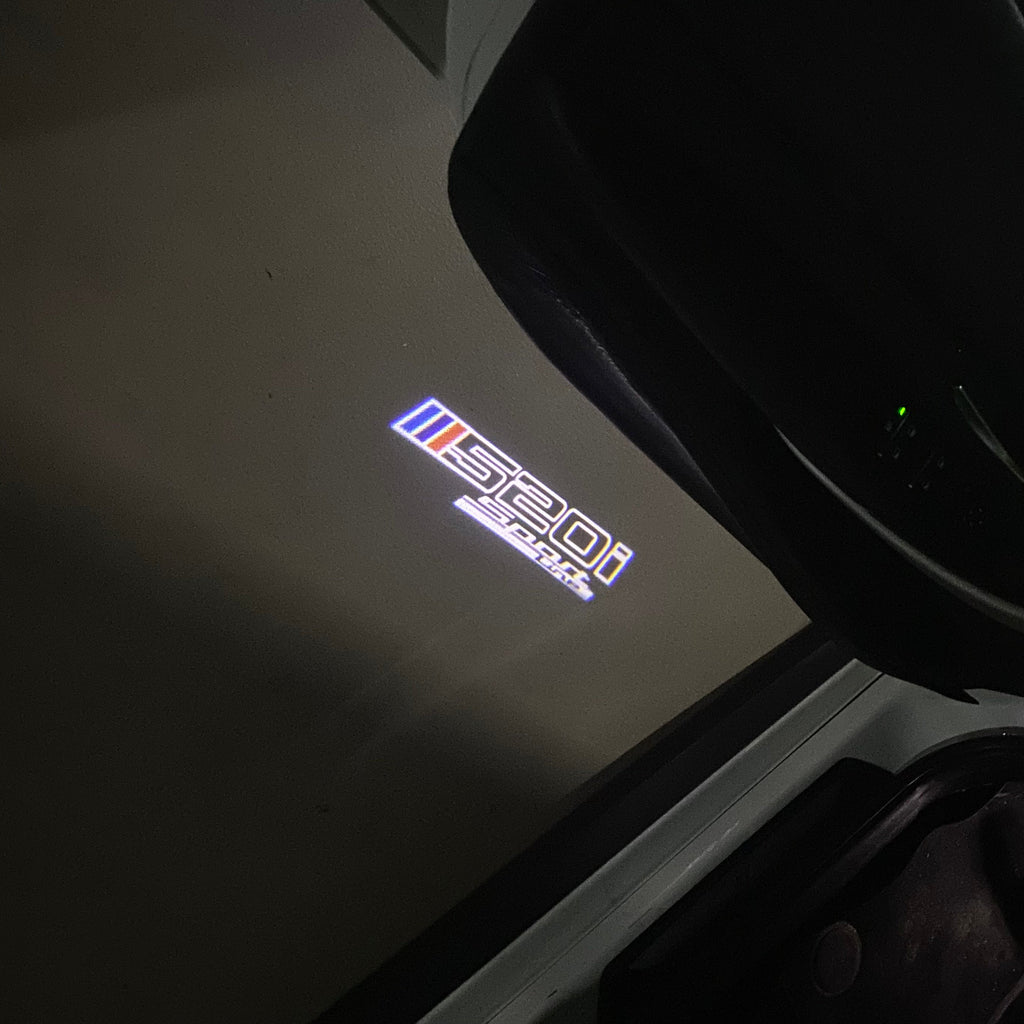 BMW  5 SERIES 520 i    LOGO PROJECTOT LIGHTS (quantity 1 = 1 sets/2 door lights)Nr.bmw00320