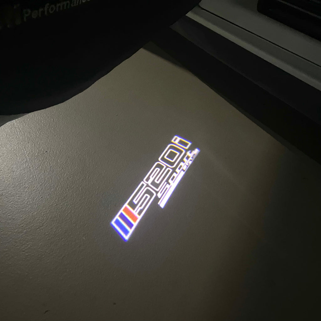 BMW  5 SERIES 520 i    LOGO PROJECTOT LIGHTS (quantity 1 = 1 sets/2 door lights)Nr.bmw00320