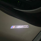 BMW   5 SERIES M550 i   LOGO PROJECTOT LIGHTS (quantity 1 = 1 sets/2 door lights)Nr.bmw00322