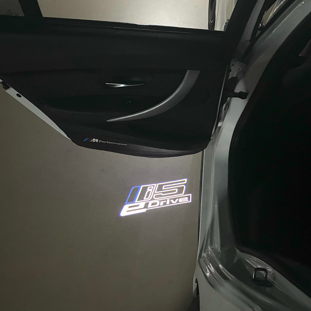 BMW 5 SERIES i5    LOGO PROJECTOT LIGHTS (quantity 1 = 1 sets/2 door lights)Nr.bmw00321