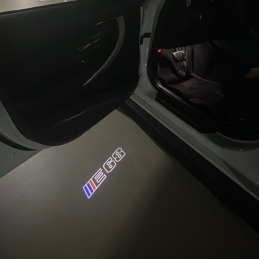 BMW 7 SERIES E68  LOGO PROJECTOT LIGHTS (quantity 1 = 1 sets/2 door lights)Nr.bmw00373