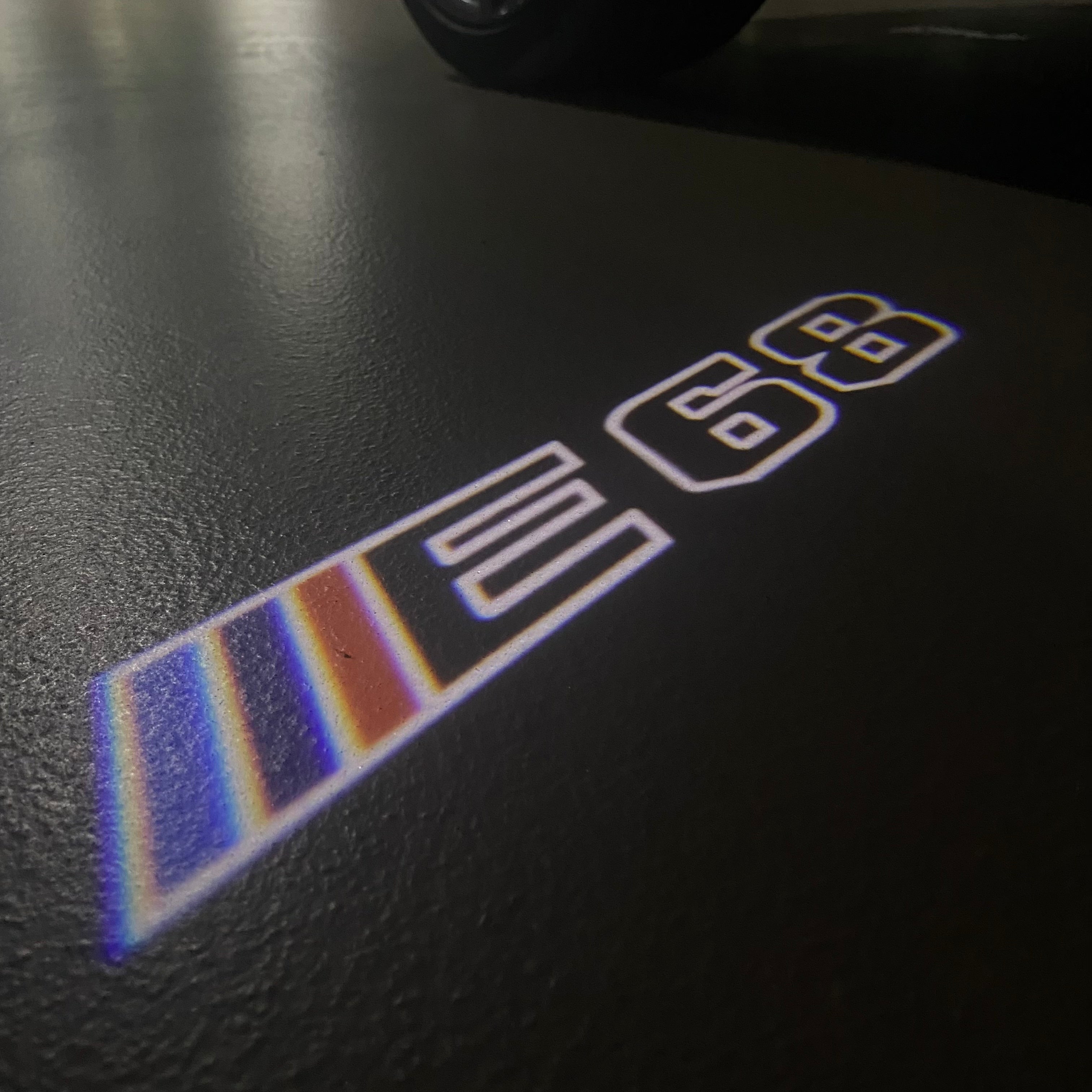 BMW 7 SERIES E68  LOGO PROJECTOT LIGHTS (quantity 1 = 1 sets/2 door lights)Nr.bmw00373