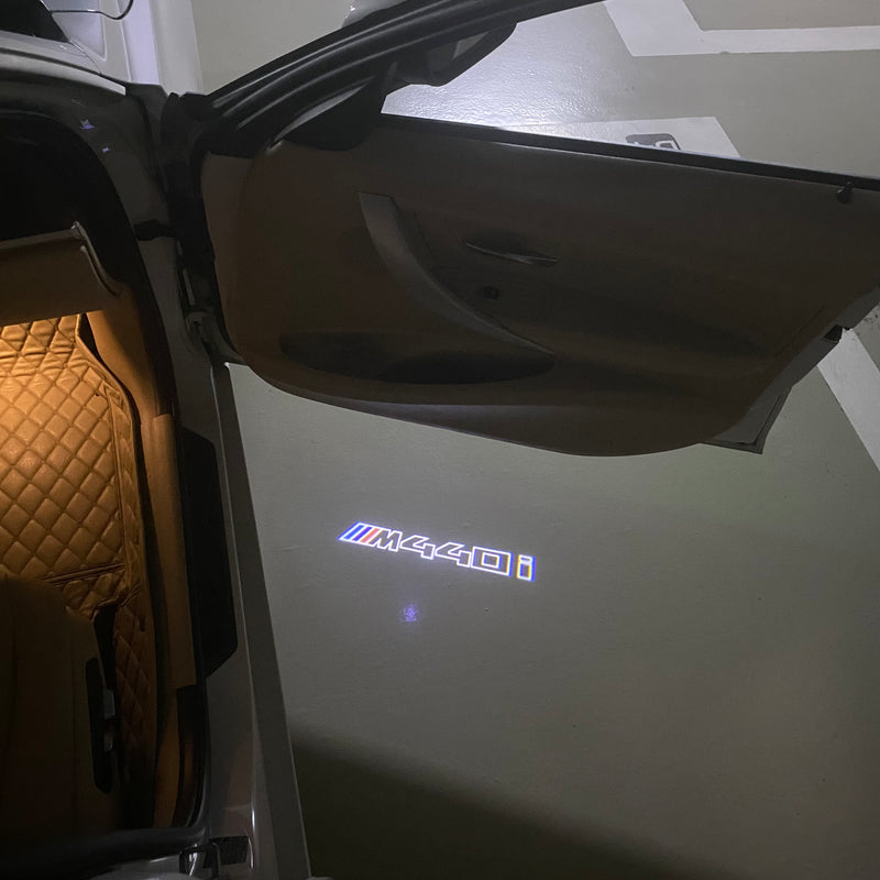 LUCI BMW M4 LOGO PROJECTOT Nr.6024 (quantità 1 = 1 set/2 luci porta)