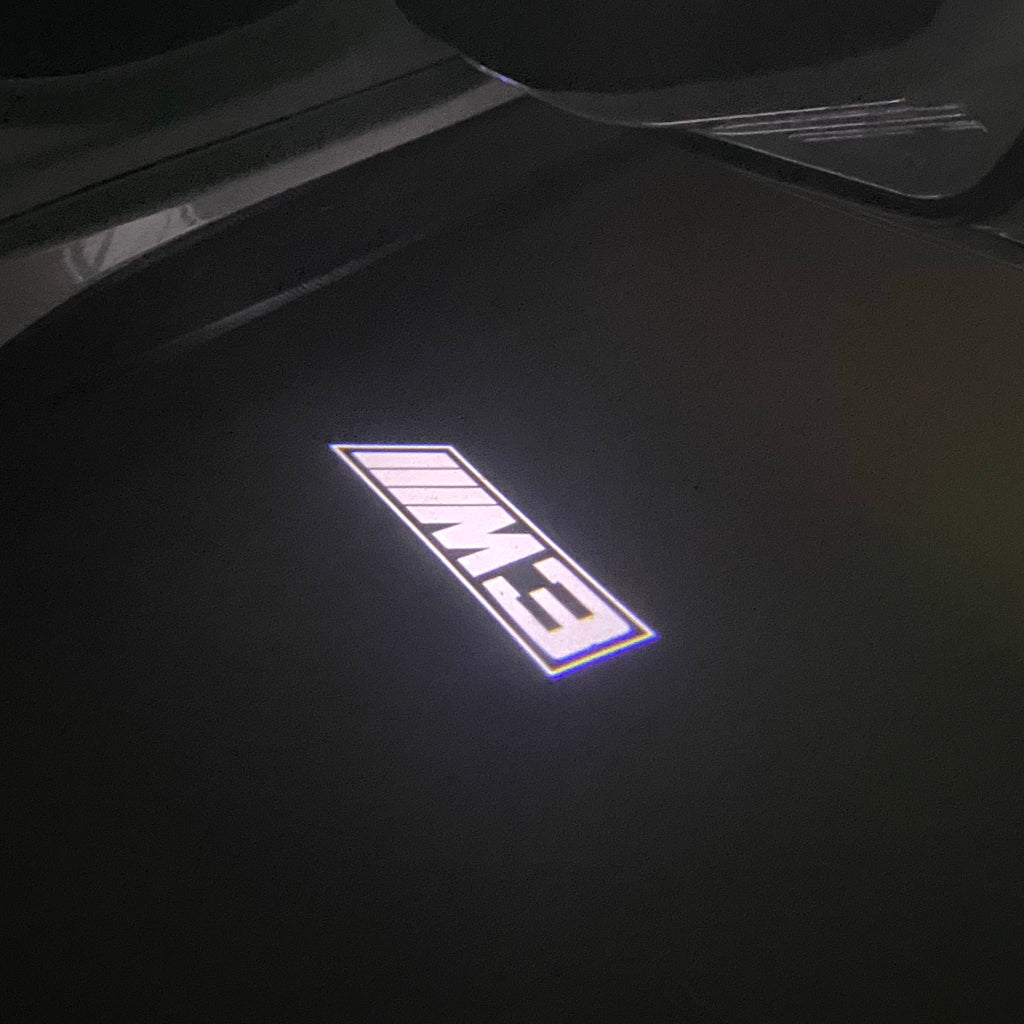 BMW 3 SERIES M3  LOGO PROJECTOT LIGHTS (quantity 1 = 1 sets/2 door lights) Nr.BMW410