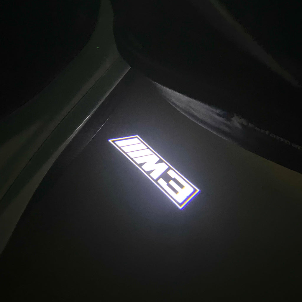 BMW 3 SERIES M3  LOGO PROJECTOT LIGHTS (quantity 1 = 1 sets/2 door lights) Nr.BMW410