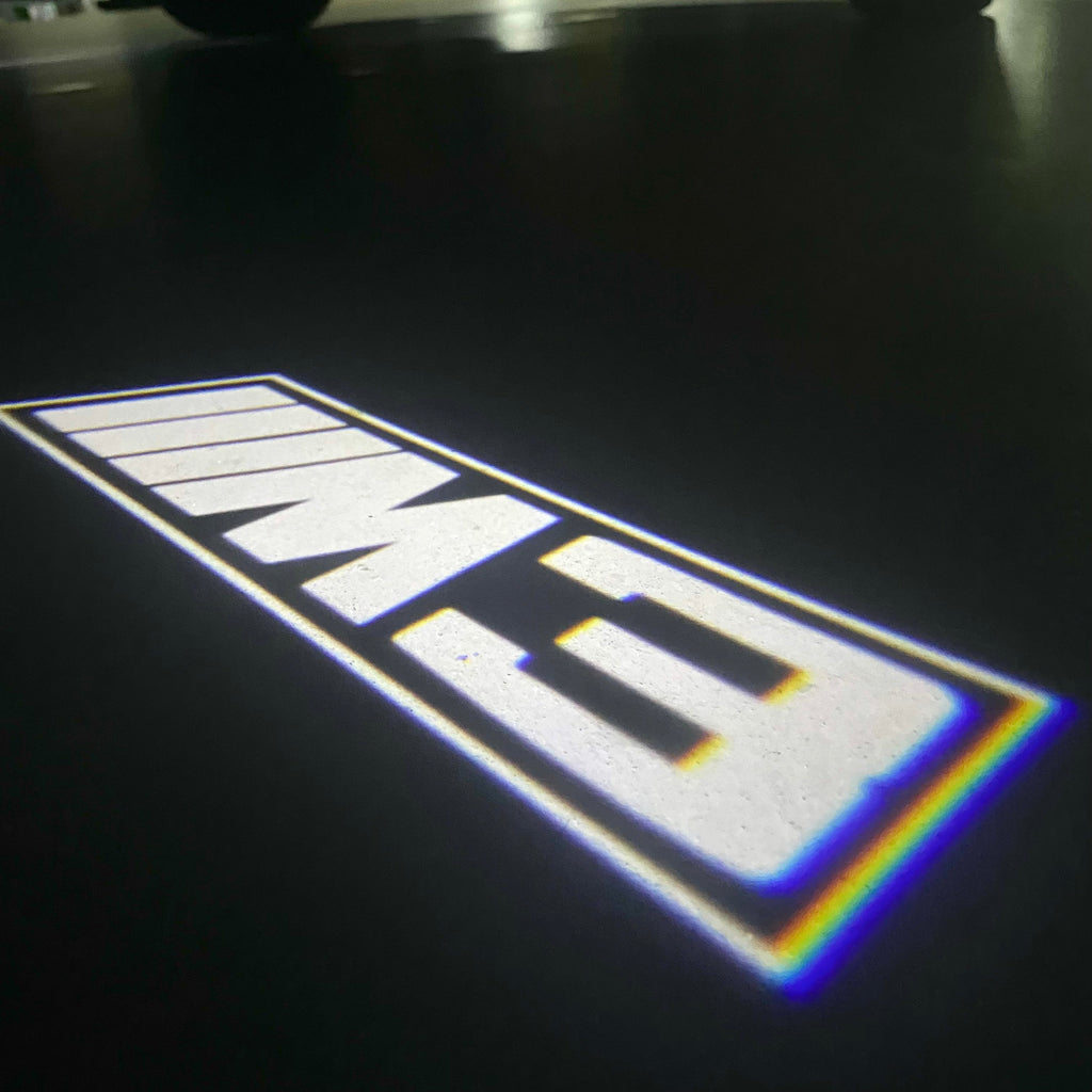 BMW 3 SERIES M3  LOGO PROJECTOT LIGHTS (quantity 1 = 1 sets/2 door lights) Nr.BMW410