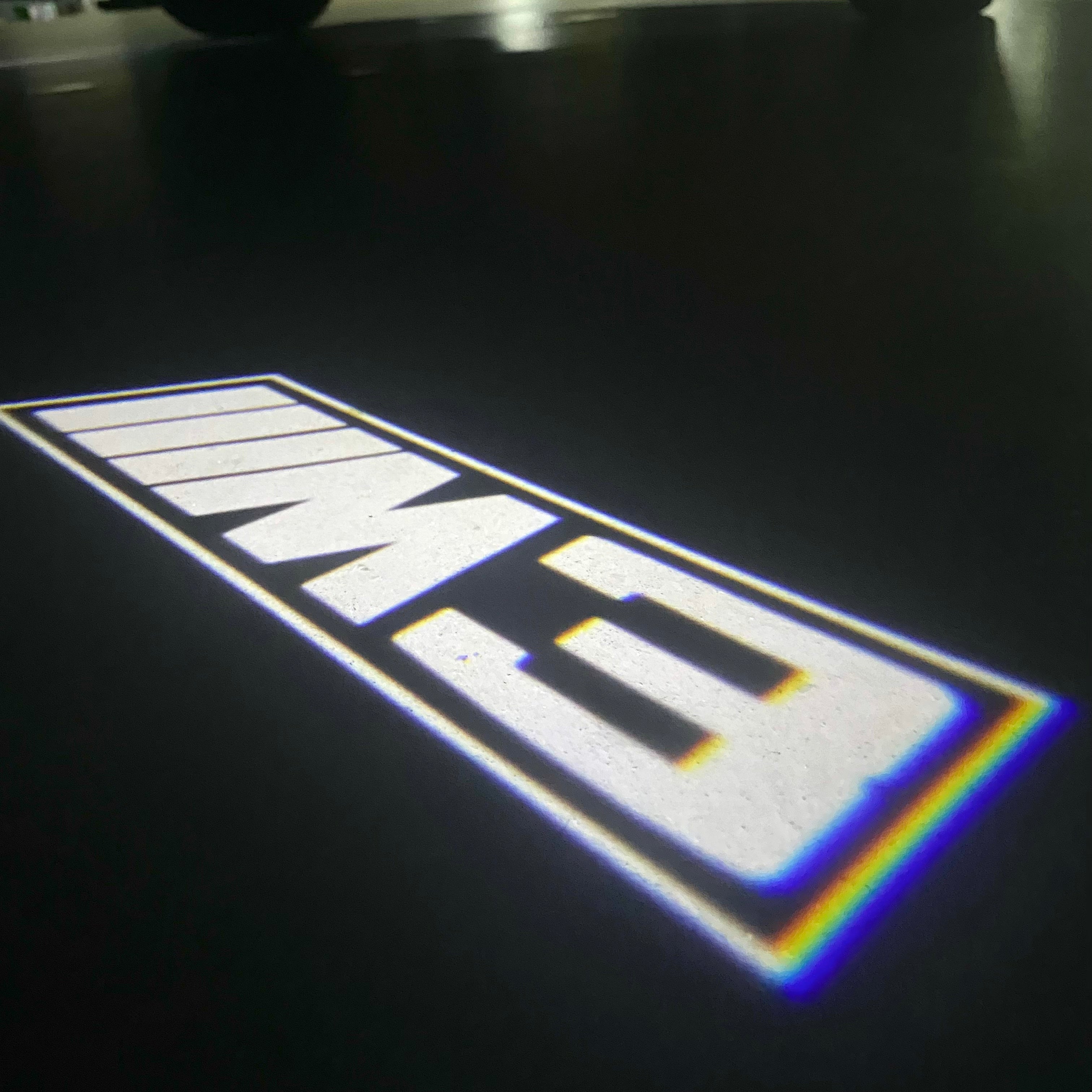 BMW 3 SERIES M3  LOGO PROJECTOT LIGHTS (quantity 1 = 1 sets/2 door lights) Nr.BMW410
