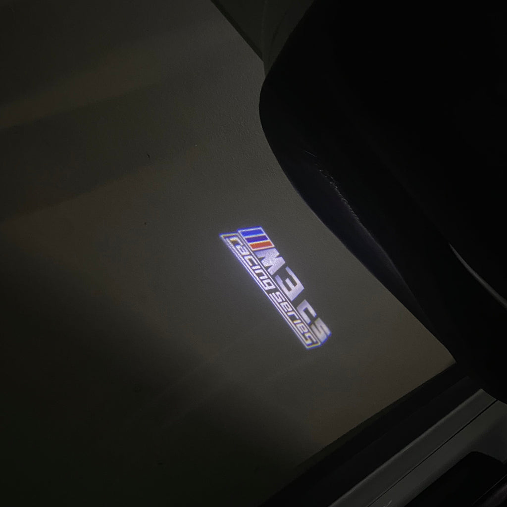 BMW 3 SERIES M3  LOGO PROJECTOT LIGHTS (quantity 1 = 1 sets/2 door lights)Nr.bmw00399