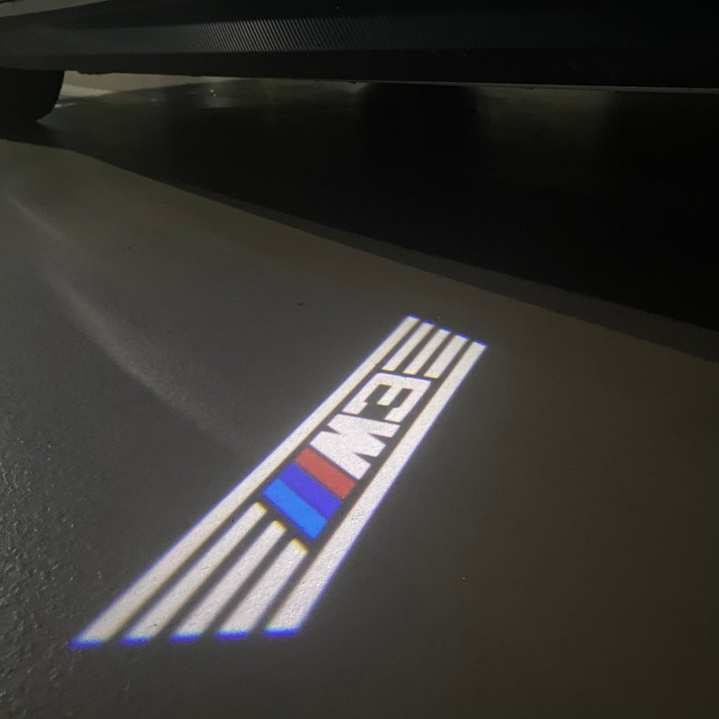 BMW 3 SERIES M3  LOGO PROJECTOT LIGHTS (quantity 1 = 1 sets/2 door lights)Nr.bmw00194