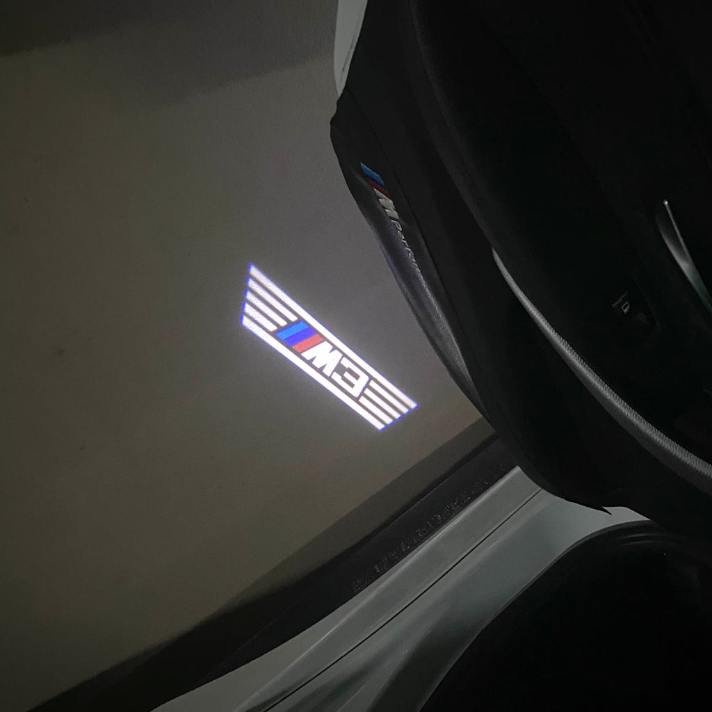 BMW 3 SERIES M3  LOGO PROJECTOT LIGHTS (quantity 1 = 1 sets/2 door lights)Nr.bmw00194
