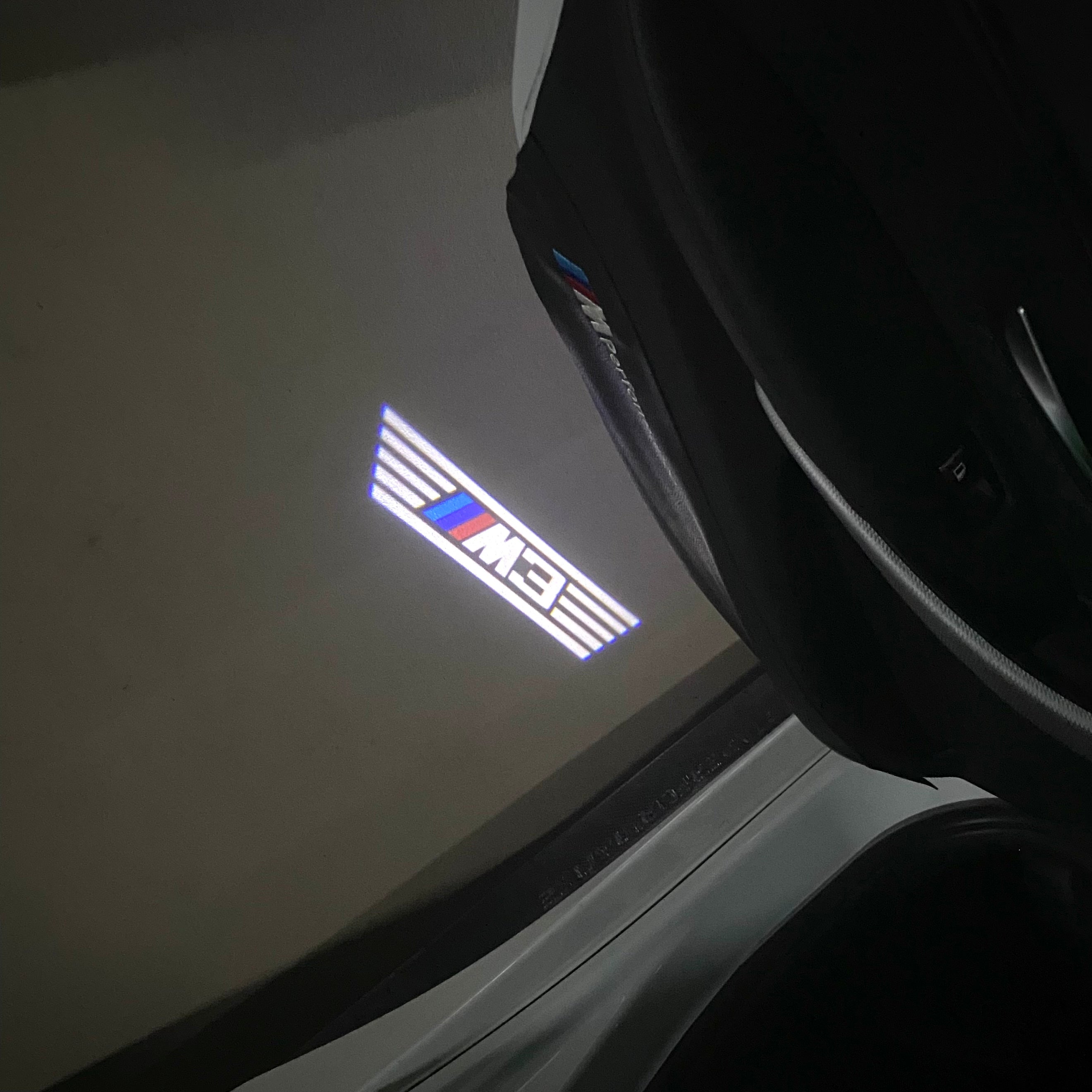 BMW 3 SERIES M3  LOGO PROJECTOT LIGHTS (quantity 1 = 1 sets/2 door lights)Nr.bmw00194