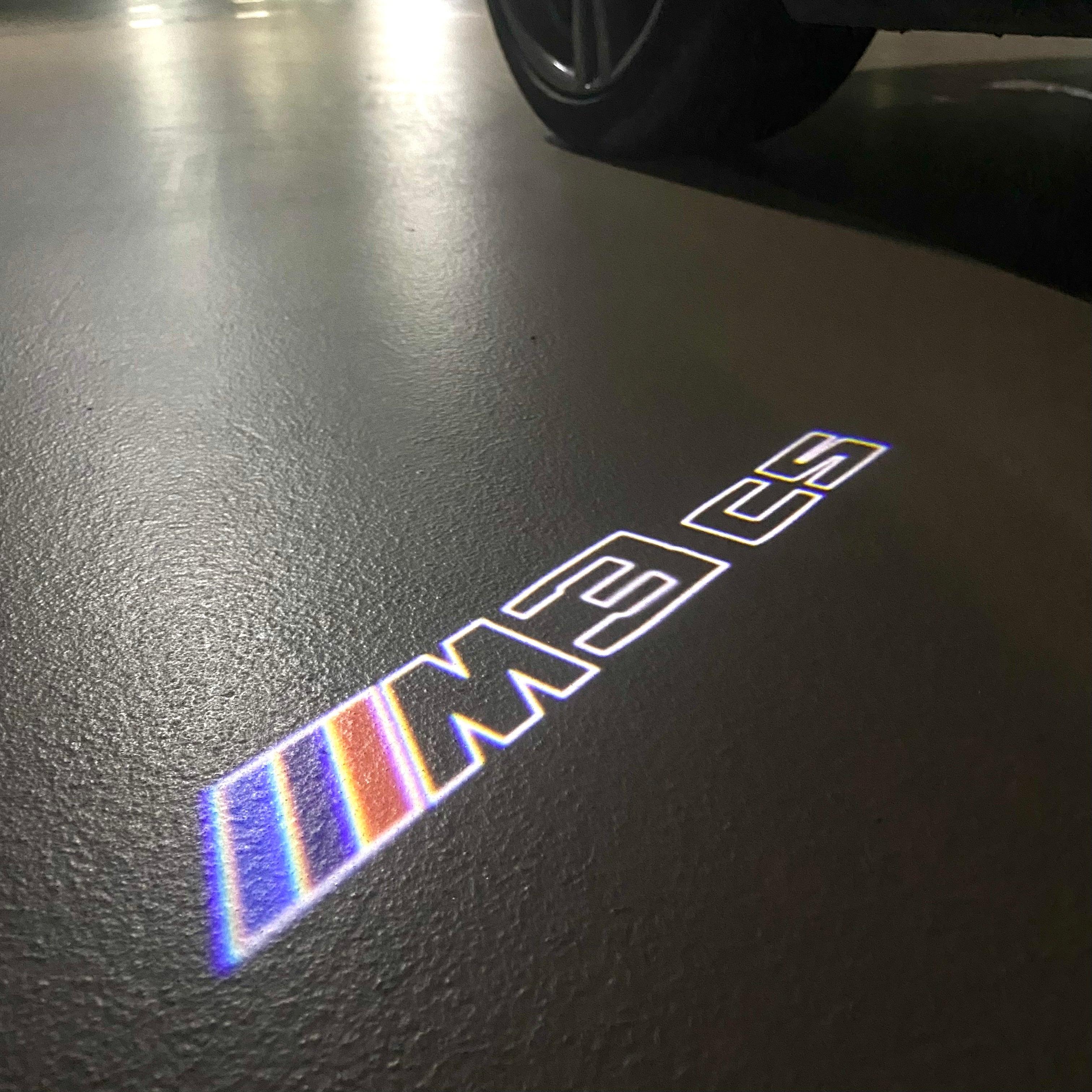 BMW 3 SERIES M3  LOGO PROJECTOT LIGHTS (quantity 1 = 1 sets/2 door lights)Nr.bmw00400