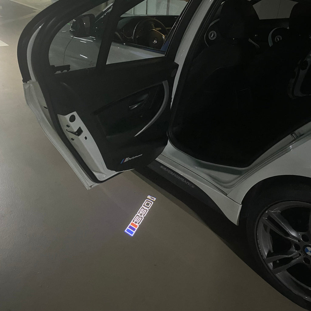 BMW 3 SERIES 330 i LOGO PROJECTOT LIGHTS (quantity 1 = 1 sets/2 door lights) Nr.BMW411