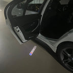 BMW 3 SERIES 330 i LOGO PROJECTOT LIGHTS (quantity 1 = 1 sets/2 door lights) Nr.BMW411