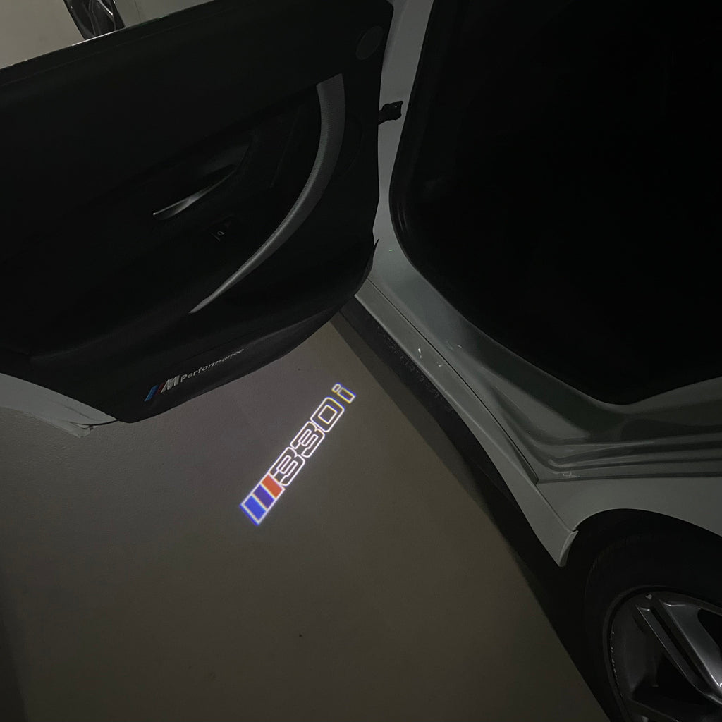 BMW 3 SERIES 330 i LOGO PROJECTOT LIGHTS (quantity 1 = 1 sets/2 door lights) Nr.BMW411