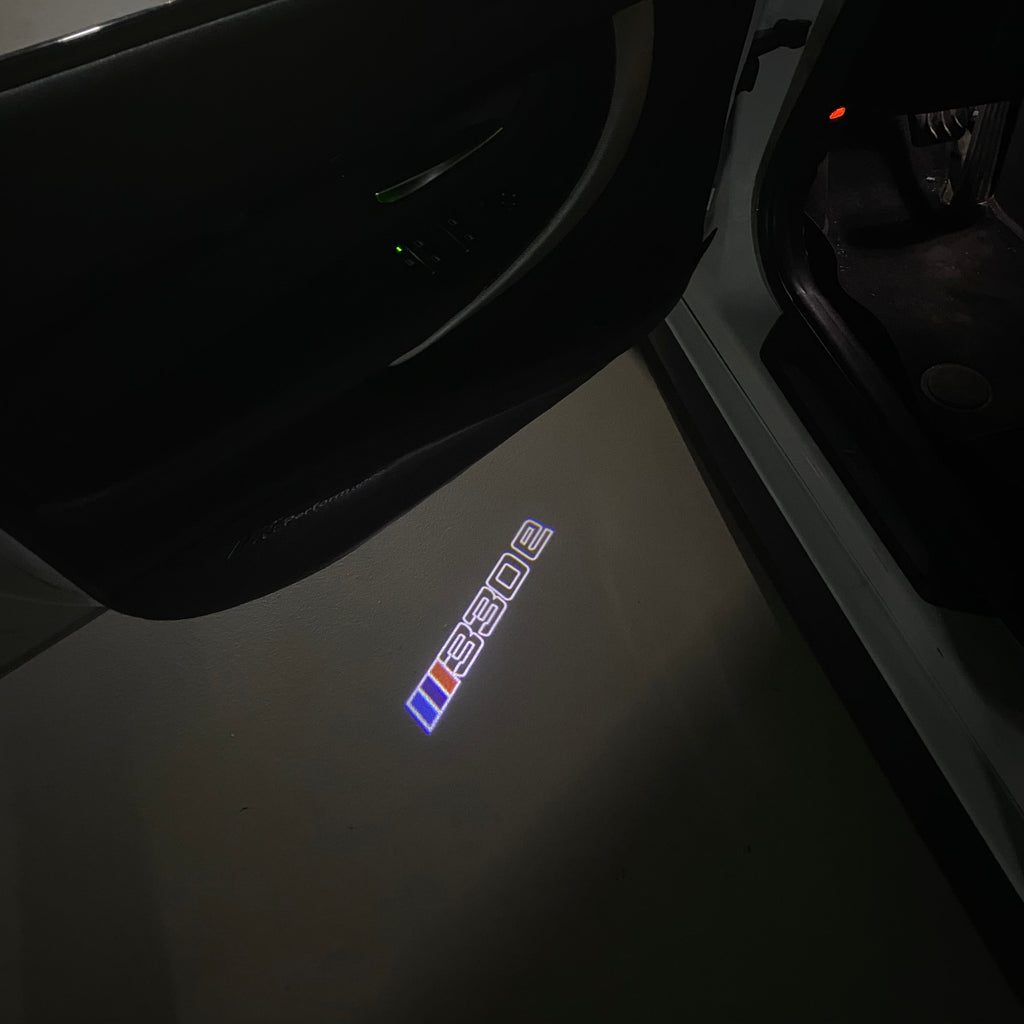 BMW 3 SERIES 330e  LOGO PROJECTOT LIGHTS (quantity 1 = 1 sets/2 door lights)Nr.bmw00396