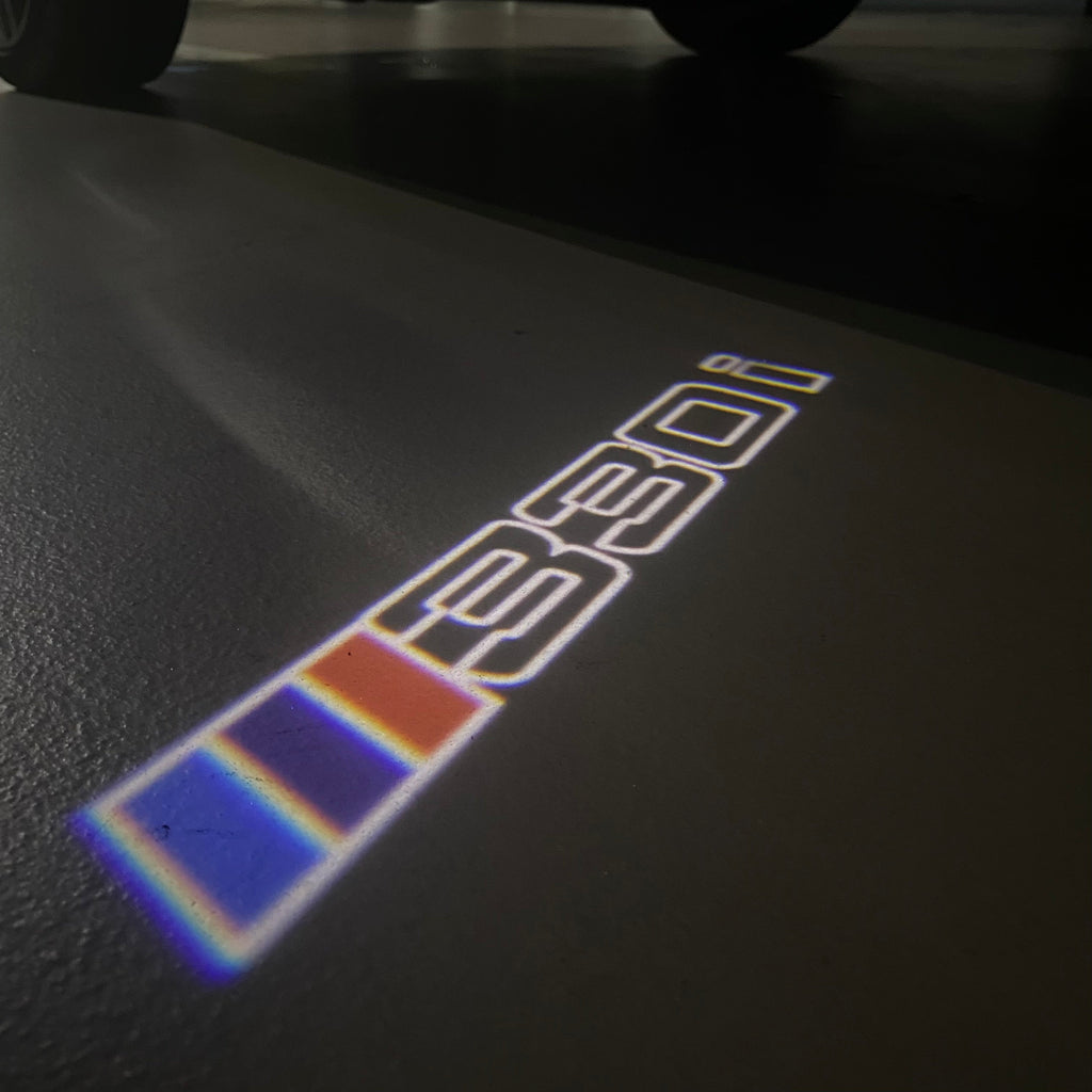 BMW 3 SERIES 330 i LOGO PROJECTOT LIGHTS (quantity 1 = 1 sets/2 door lights) Nr.BMW411
