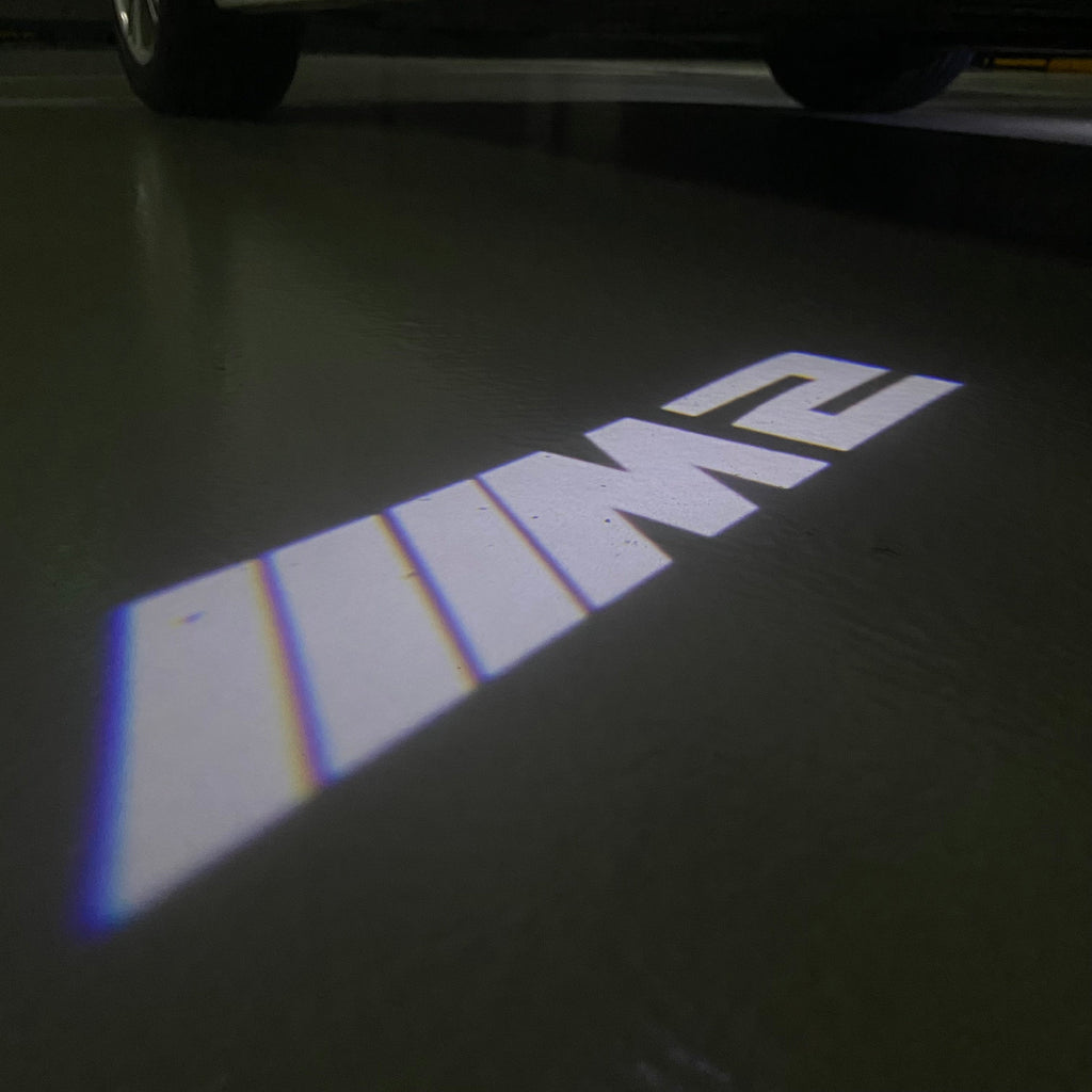 BMW 2 SERIES M2  LOGO PROJECTOT LIGHTS (quantity 1 = 1 sets/2 door lights)Nr.bmw00214