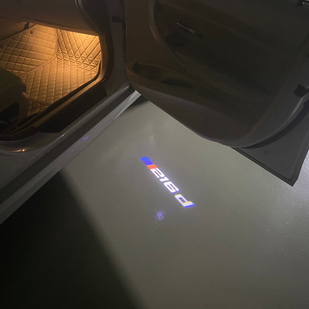 BMW  2 SERIES 216 LOGO PROJECTOT LIGHTS (quantity 1 = 1 sets/2 door lights)Nr.bmw00204