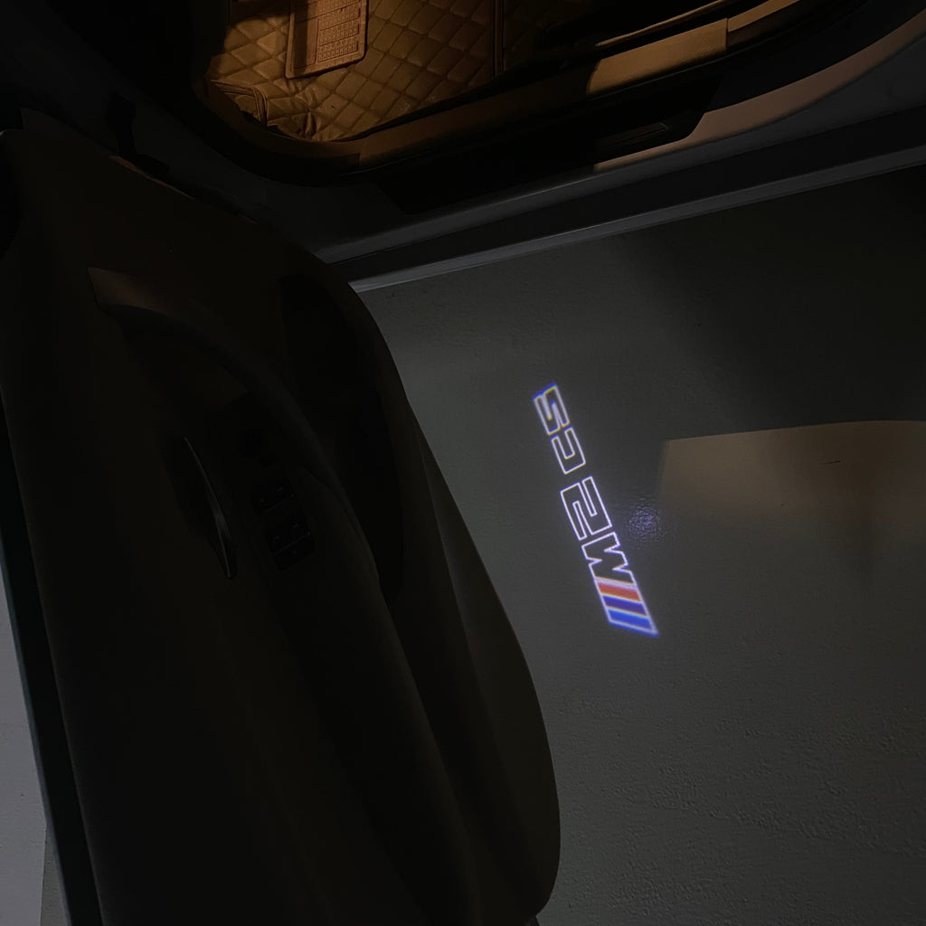 BMW  2 SERIES M2 LOGO PROJECTOT LIGHTS (quantity 1 = 1 sets/2 door lights)Nr.bmw00199