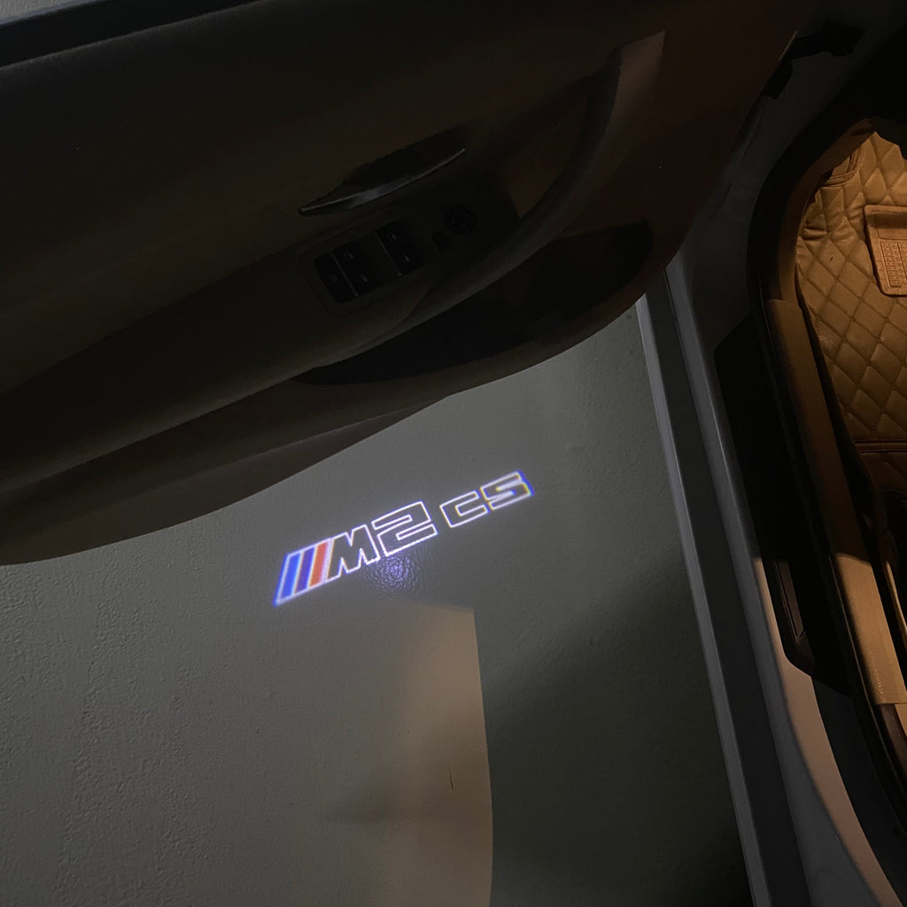 BMW  2 SERIES M2 LOGO PROJECTOT LIGHTS (quantity 1 = 1 sets/2 door lights)Nr.bmw00199
