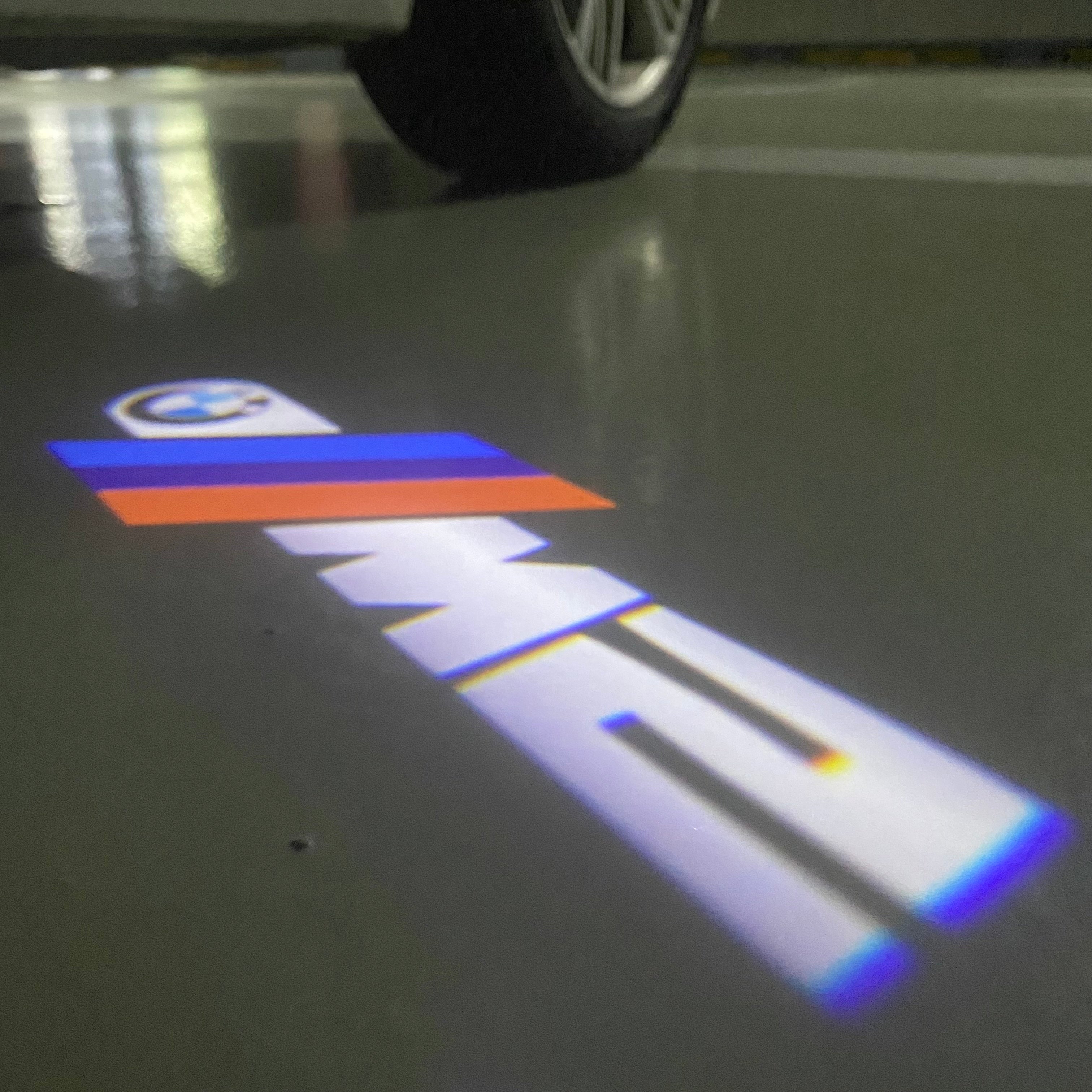 BMW  2 SERIES M2 LOGO PROJECTOT LIGHTS (quantity 1 = 1 sets/2 door lights)Nr.bmw00140