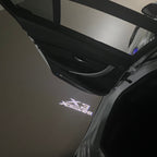 BMW  X3 X drive 28  LOGO PROJECTOT LIGHTS (quantity 1 = 1 sets/2 door lights)Nr.bmw0054