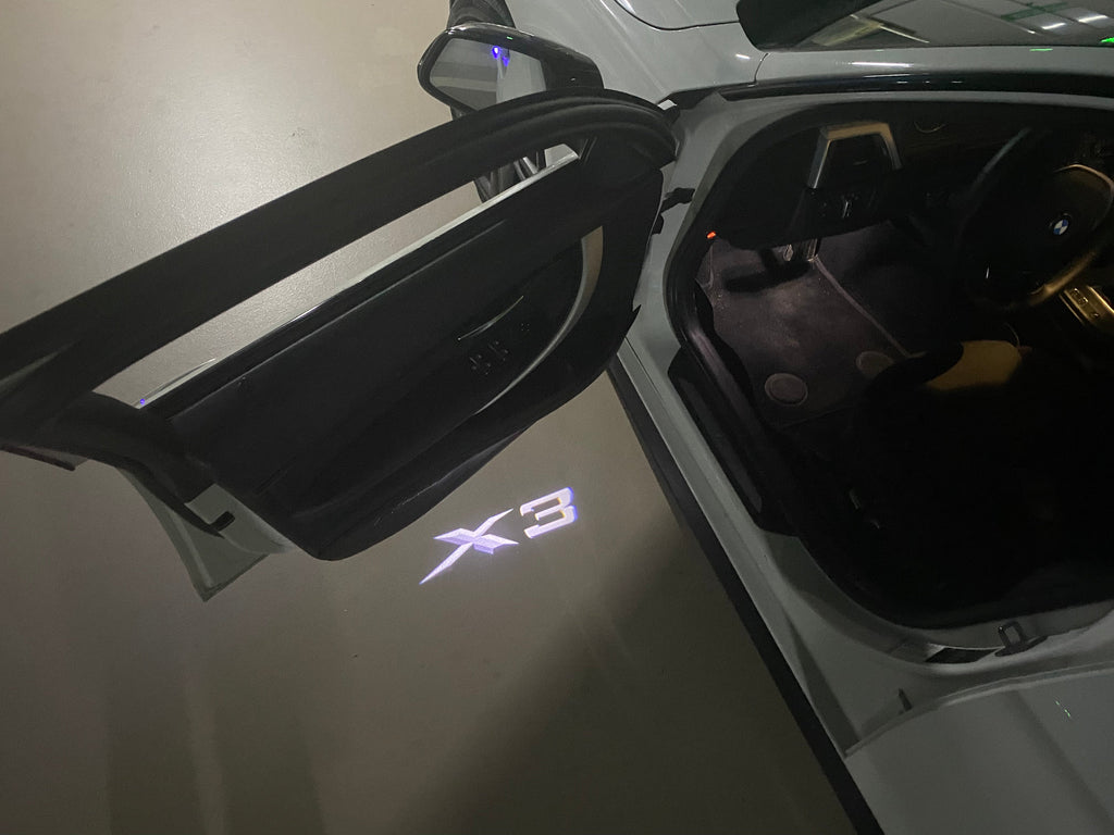 BMW X3  LOGO PROJECTOT LIGHTS (quantity 1 = 1 sets/2 door lights)Nr.bmw0062