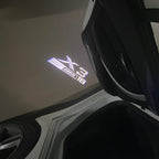 BMW X3 S Drive 18 LOGO PROJECTOT LIGHTS (quantity 1 = 1 sets/2 door lights)Nr.bmw0052