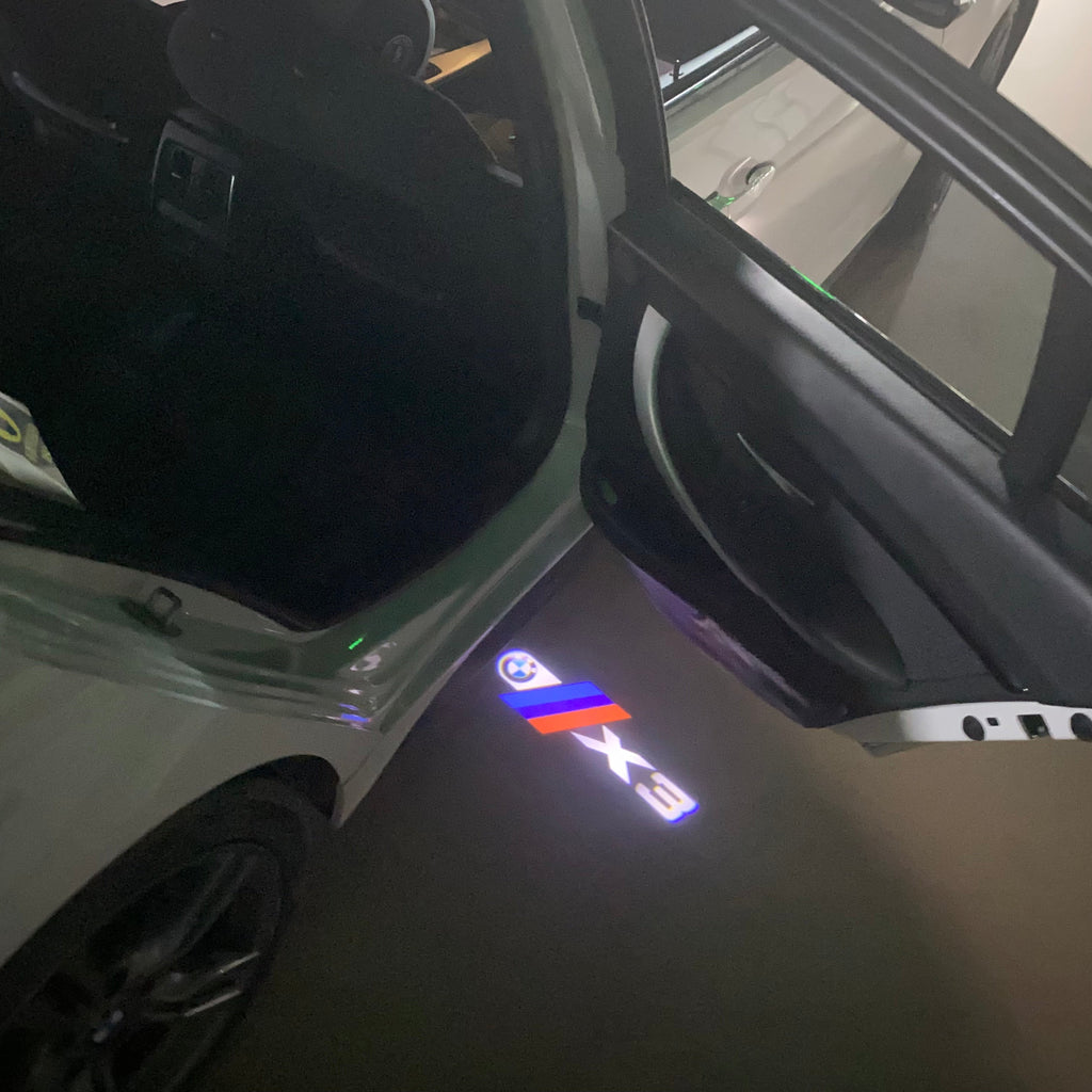 BMW X3    LOGO PROJECTOT LIGHTS (quantity 1 = 1 sets/2 door lights)Nr.bmw0049