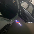 BMW X3    LOGO PROJECTOT LIGHTS (quantity 1 = 1 sets/2 door lights)Nr.bmw0049