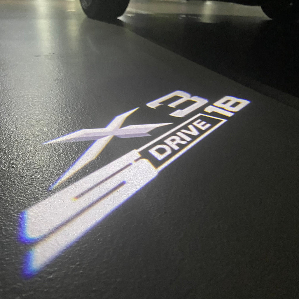 BMW X3 S Drive 18 LOGO PROJECTOT LIGHTS (quantity 1 = 1 sets/2 door lights)Nr.bmw0052